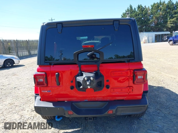 2023 Jeep Wrangler Sahara z VIN 1C4JJXP63PW568190, wystawiony jako IAAI lot #42133650 z przebiegiem 32 347 mil mil oraz . Historia ofert i sprzedaży dostępna na DreamBid. Obrazek 16.