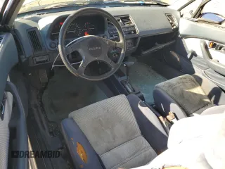 1989 Acura Integra z VIN JH4DA3448KS004042, wystawiony jako Copart lot #85917354 z przebiegiem 126 899 mil mil oraz Szkoda całkowita • Salvage title. Historia ofert i sprzedaży dostępna na DreamBid. Obrazek 8.
