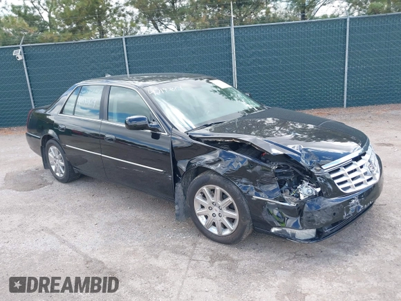 2009 Cadillac DTS 1SC z VIN 1G6KD57Y29U141800, wystawiony jako IAAI lot #42190874 z przebiegiem 115 043 mil mil oraz . Historia ofert i sprzedaży dostępna na DreamBid. Obrazek 1.