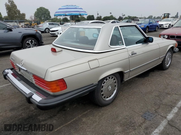 1987 Mercedes-Benz 560 SL z VIN WDBBA48D6HA070949, wystawiony jako Copart lot #75353644 z przebiegiem 114 792 mil mil oraz Czysty tytuł • Clean title. Historia ofert i sprzedaży dostępna na DreamBid. Obrazek 3.