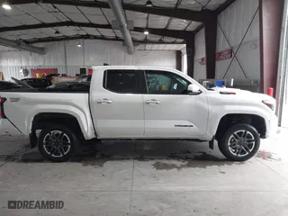 2024 Toyota Tacoma 4WD SR5 with VIN 3TMLB5JN8RM035278, listed as a IAAI auction lot 41789088 with 10,695 mi miles. Bid and sale history available at carsss.com. Image 13.