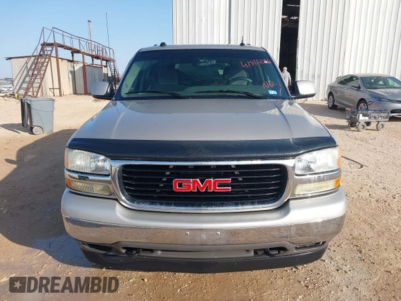 2005 GMC Yukon SLT with VIN 1GKEK13T95R203827, listed as a IAAI auction lot 41815086 with 136,671 mi miles. Bid and sale history available at carsss.com. Image 12.