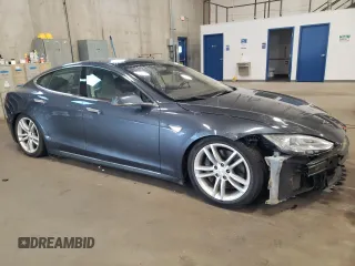 2014 Tesla Model S 60 with VIN 5YJSA1H14EFP53113, listed as a Copart auction lot 69430934 with 116,970 mi miles and Non repairable. Bid and sale history available at DreamBid. Image 4.