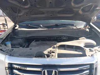 2013 Honda Pilot Touring with VIN 5FNYF4H94DB035692, listed as a IAAI auction lot 41771116 with 137,464 mi miles and . Bid and sale history available at carsss.com. Image 10.