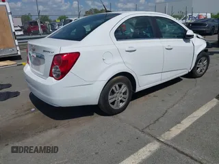 2014 Chevrolet Sonic LT with VIN 1G1JC5SH0E4232070, listed as a IAAI auction lot 41970353 with 140,557 mi miles and . Bid and sale history available at DreamBid. Image 4.