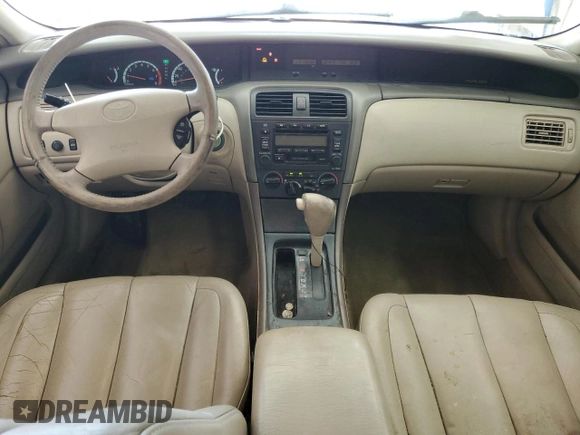 2000 Toyota Avalon XL with VIN 4T1BF28B9YU112742, listed as a Copart auction lot 54719355 with 213,896 mi miles and Salvage Title. Bid and sale history available at DreamBid. Image 8.