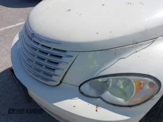 2006 Chrysler PT Cruiser Touring z VIN 3A4FY58B26T215567, wystawiony jako IAAI lot #42345985 z przebiegiem Nie podano mil oraz . Historia ofert i sprzedaży dostępna na DreamBid. Obrazek 13.