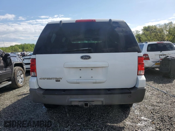 2004 Ford Expedition Special Service with VIN 1FMEU15W04LA49387, listed as a Copart auction lot 52386065 with 322,325 mi miles and Salvage title. Bid and sale history available at DreamBid. Image 6.