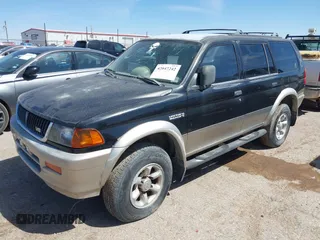 1998 Mitsubishi Montero LS z VIN JA4MT31P9WP005522, wystawiony jako IAAI lot #42047242 z przebiegiem Nie podano mil oraz . Historia ofert i sprzedaży dostępna na DreamBid. Obrazek 2.