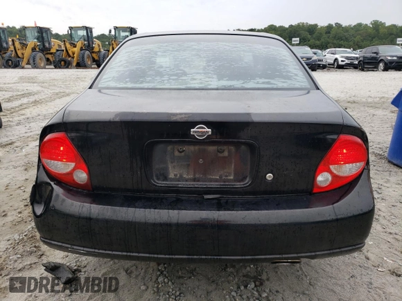 2000 Nissan Maxima GXE z VIN JN1CA31A8YT210913, wystawiony jako Copart lot #56272455 z przebiegiem 281 645 mil mil oraz Nie do naprawy • Non repairable. Historia ofert i sprzedaży dostępna na DreamBid. Obrazek 6.