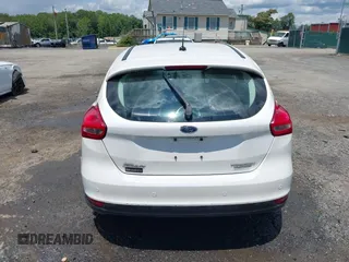 2016 Ford Focus Titanium with VIN 1FADP3N21GL309340, listed as a IAAI auction lot 42518653 with 101,555 mi miles and . Bid and sale history available at DreamBid. Image 16.