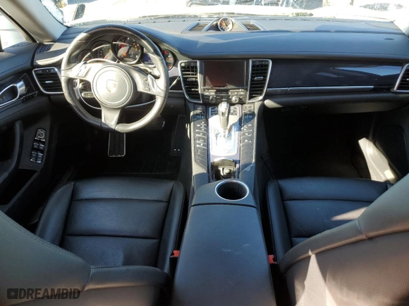 2015 Porsche Panamera 4 with VIN WP0AA2A7XFL007425, listed as a Copart auction lot 39322434 with 74,117 mi miles. Bid and sale history available at carsss.com. Image 8.