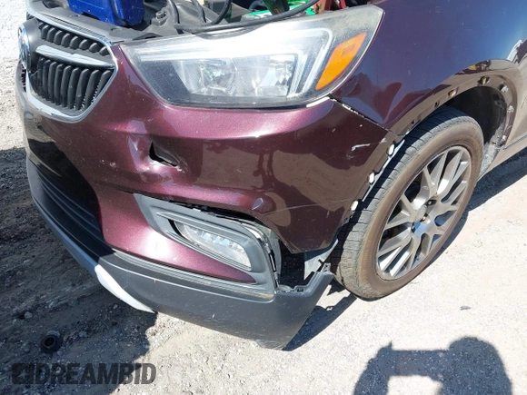 2018 Buick Encore Sport Touring with VIN KL4CJ1SB1JB641530, listed as a IAAI auction lot 42057859 with 151,364 mi miles. Bid and sale history available at carsss.com. Image 6.