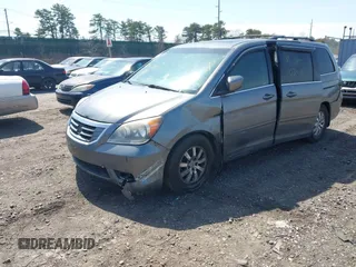 2009 Honda Odyssey EX-L with VIN 5FNRL38699B016981, listed as a IAAI auction lot 41950144 with Not Provided miles and . Bid and sale history available at DreamBid. Image 2.