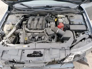 2012 Ford Fusion SEL z VIN 3FAHP0JG1CR141390, wystawiony jako Copart lot #59308505 z przebiegiem 63 955 mil mil oraz Szkoda całkowita • Salvage title. Historia ofert i sprzedaży dostępna na DreamBid. Obrazek 11.