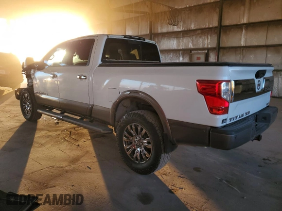 2016 Nissan Titan XD Platinum Reserve with VIN 1N6BA1F42GN512715, listed as a Copart auction lot 88910205 with 85,364 mi miles and Salvage Title. Bid and sale history available at carsss.com. Image 2.