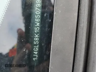 2005 Jeep Liberty Limited z VIN 1J4GL58K15W650799, wystawiony jako Copart lot #56036635 z przebiegiem 147 321 mil mil oraz Szkoda całkowita • Salvage title. Historia ofert i sprzedaży dostępna na DreamBid. Obrazek 13.