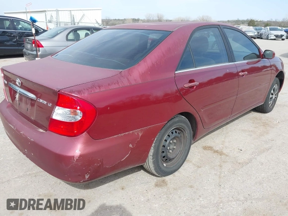 2004 Toyota Camry LE with VIN JTDBE32K840271548, listed as a IAAI auction lot 41835859 with 172,455 mi miles. Bid and sale history available at carsss.com. Image 4.