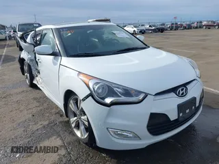 2017 Hyundai Veloster with VIN KMHTC6ADXHU318331, listed as a IAAI auction lot 41588356 with 48,282 mi miles. Bid and sale history available at carsss.com. Image 1.