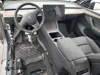2024 Tesla Model Y with VIN 7SAYGDED6RF131193, listed as a Copart auction lot 47822735 with 10,007 mi miles and Salvage Title. Bid and sale history available at DreamBid. Image 8.