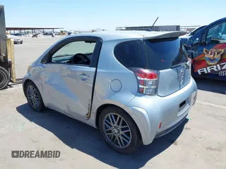 2014 Scion iQ with VIN JTNJJXB02EJ027026, listed as a IAAI auction lot 42619439 with 103,261 mi miles and . Bid and sale history available at DreamBid. Image 3.