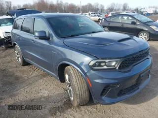 2021 Dodge Durango R/T with VIN 1C4SDJCT9MC720295, listed as a IAAI auction lot 41947876 with 104,670 mi miles and . Bid and sale history available at DreamBid. Image 1.