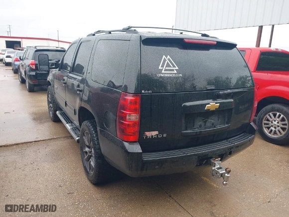 2013 Chevrolet Tahoe LT with VIN 1GNSKBE01DR374262, listed as a IAAI auction lot 41960707 with 243,045 mi miles. Bid and sale history available at carsss.com. Image 3.