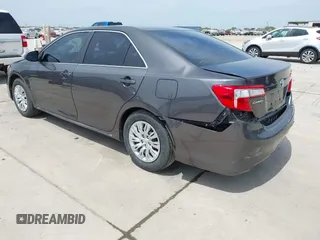 2014 Toyota Camry L with VIN 4T4BF1FKXER379158, listed as a IAAI auction lot 42050926 with 88,060 mi miles and . Bid and sale history available at DreamBid. Image 3.