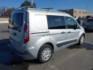 2015 Ford Transit Connect with VIN NM0KS6FX5F1214847, listed as a IAAI auction lot 41125254 with 86,572 mi miles and . Bid and sale history available at DreamBid. Image 4.