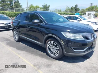 2016 Lincoln MKX Reserve z VIN 2LMTJ6LP1GBL74874, wystawiony jako IAAI lot #42375170 z przebiegiem 87 512 mil mil oraz . Historia ofert i sprzedaży dostępna na DreamBid. Obrazek 1.