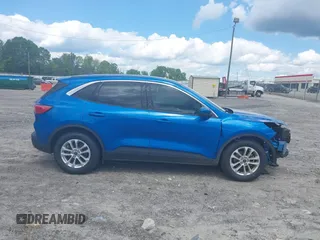 2020 Ford Escape SE with VIN 1FMCU0G61LUB55743, listed as a IAAI auction lot 42190522 with 76,919 mi miles and . Bid and sale history available at DreamBid. Image 14.