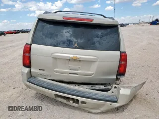 2015 Chevrolet Suburban LT with VIN 1GNSCJKC0FR153454, listed as a Copart auction lot 62672615 with 184,498 mi miles and Salvage title. Bid and sale history available at DreamBid. Image 6.