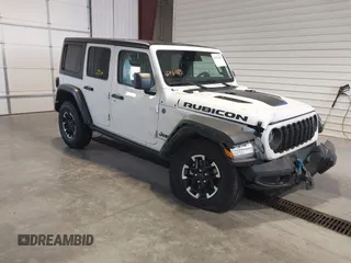 2024 Jeep Wrangler Rubicon with VIN 1C4RJXR60RW292764, listed as a IAAI auction lot 42761185 with 34,298 mi miles and . Bid and sale history available at DreamBid. Image 1.