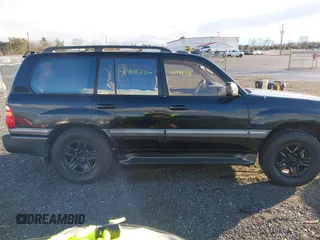 2000 Toyota Land Cruiser with VIN JT3HT05J7Y0110667, listed as a IAAI auction lot 41248220 with 208,043 mi miles. Bid and sale history available at carsss.com. Image 13.