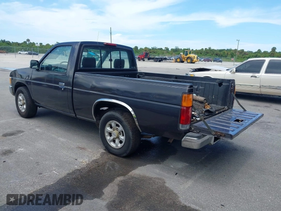 1997 Nissan Frontier XE with VIN 1N6SD11S0VC334308, listed as a IAAI auction lot 42468050 with 250,965 mi miles and . Bid and sale history available at DreamBid. Image 3.