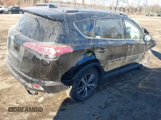 2018 Toyota RAV4 XLE with VIN 2T3RFREV2JW811214, listed as a IAAI auction lot 41458588 with 236,346 mi miles. Bid and sale history available at carsss.com. Image 4.