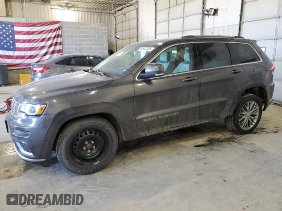 2017 Jeep Grand Cherokee Summit with VIN 1C4RJFJT4HC723876, listed as a Copart auction lot 52647205 with 97,412 mi miles and Salvage title. Bid and sale history available at DreamBid. Image 1.