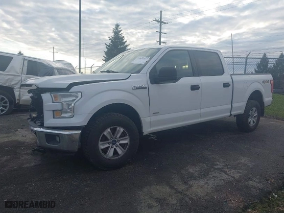 2015 Ford F-150 XLT w/HD Payload Pkg with VIN 1FTFW1EG3FFC39052, listed as a IAAI auction lot 41046847 with 151,061 mi miles. Bid and sale history available at carsss.com. Image 2.
