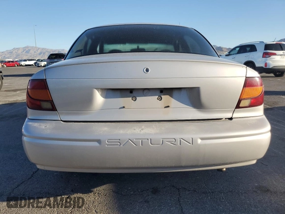 2000 Saturn SL with VIN 1G8ZH5281YZ242734, listed as a Copart auction lot 57433915 with Not provided miles and Salvage title. Bid and sale history available at DreamBid. Image 6.