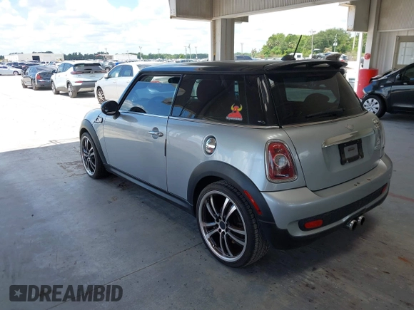 2008 MINI Hardtop S with VIN WMWMF73548TV35548, listed as a IAAI auction lot 42521348 with 104,427 mi miles and . Bid and sale history available at DreamBid. Image 3.