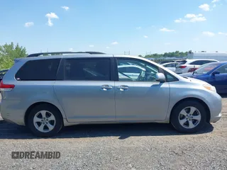 2011 Toyota Sienna LE AAS with VIN 5TDKK3DC2BS096965, listed as a IAAI auction lot 42583783 with 288,489 mi miles and . Bid and sale history available at DreamBid. Image 13.