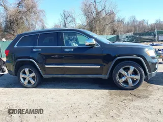2011 Jeep Grand Cherokee Overland with VIN 1J4RS6GGXBC659349, listed as a IAAI auction lot 41778399 with 219,624 mi miles and . Bid and sale history available at DreamBid. Image 13.