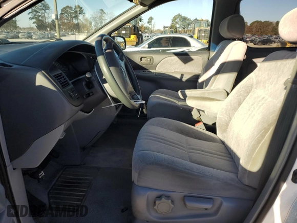 2000 Toyota Sienna LE with VIN 4T3ZF13C5YU201708, listed as a Copart auction lot 83924024 with 219,940 mi miles and Salvage Title. Bid and sale history available at DreamBid. Image 7.