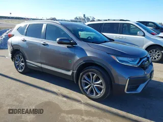 2021 Honda CR-V Touring with VIN 2HKRW2H96MH663358, listed as a IAAI auction lot 41217973 with 51,368 mi miles. Bid and sale history available at carsss.com. Image 1.