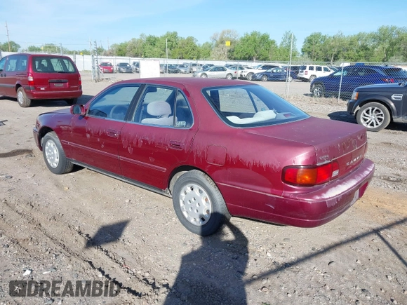 1996 Toyota Camry DX with VIN JT2BG12K4T0363844, listed as a IAAI auction lot 42215996 with 214,452 mi miles and . Bid and sale history available at DreamBid. Image 3.