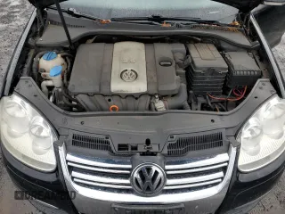 2009 Volkswagen Jetta z VIN 3VWKZ71K09M250143, wystawiony jako Copart lot #82247774 z przebiegiem 156 600 mil mil oraz Szkoda całkowita • Salvage title. Historia ofert i sprzedaży dostępna na DreamBid. Obrazek 11.