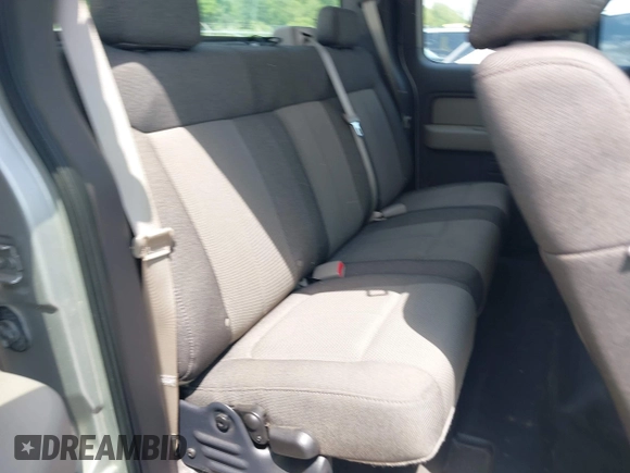 2009 Ford F-150 STX z VIN 1FTRX12W59KB81818, wystawiony jako IAAI lot #42073182 z przebiegiem 76 968 mil mil oraz . Historia ofert i sprzedaży dostępna na DreamBid. Obrazek 8.