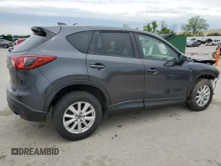 2014 Mazda CX-5 Touring z VIN JM3KE4CY2E0368729, wystawiony jako Copart lot #55563645 z przebiegiem 204 521 mil mil oraz Szkoda całkowita • Salvage title. Historia ofert i sprzedaży dostępna na DreamBid. Obrazek 3.
