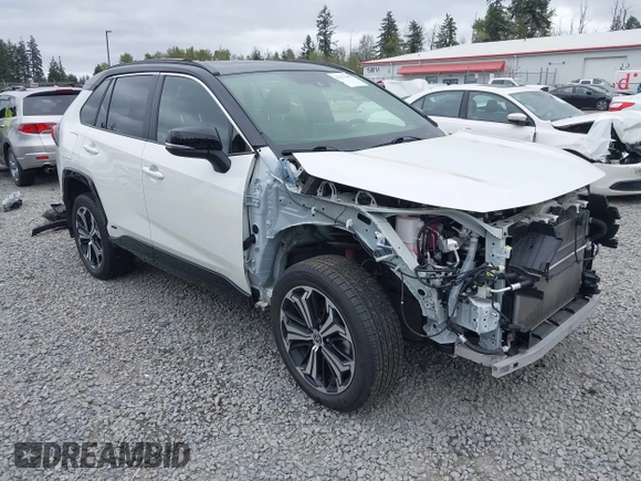 2022 Toyota RAV4 XSE with VIN JTMEB3FV1ND100256, listed as a IAAI auction lot 42127288 with 30,367 mi miles and . Bid and sale history available at DreamBid. Image 1.