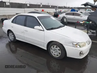 2002 Toyota Corolla CE with VIN 1NXBR12E42Z577246, listed as a IAAI auction lot 41761488 with 79,155 mi miles and . Bid and sale history available at DreamBid. Image 1.